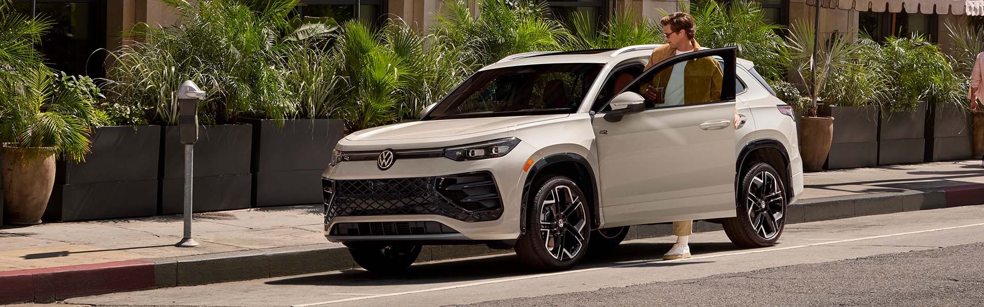 Volkswagen SUVs parked near South Congress in Austin TX, showcasing Tiguan, Atlas, and Taos models